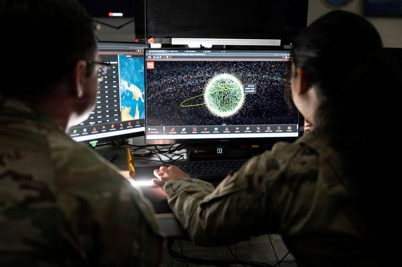 Space Force Guardians assigned to Space Delta 5 monitor a computer workstation
