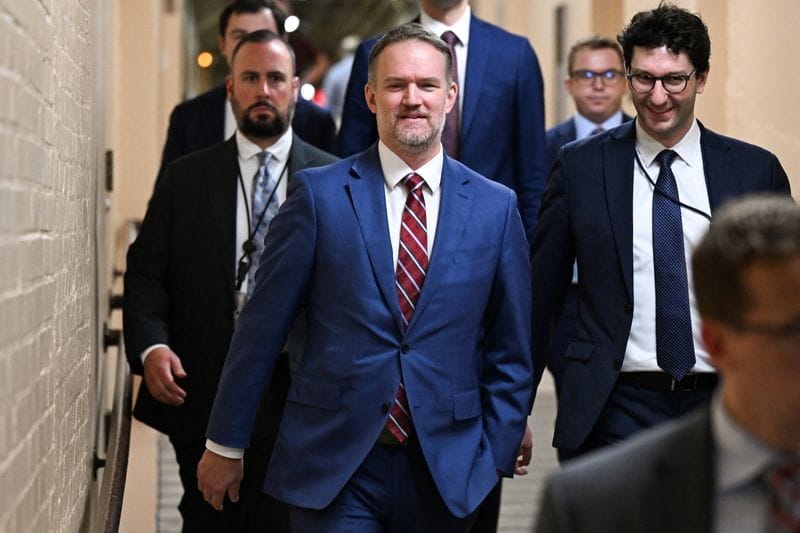 U.S. Trade Representative Jamieson Greer walks to a meeting with House Republicans to discuss trade with Canada, on Capitol Hill in Washington, D.C.