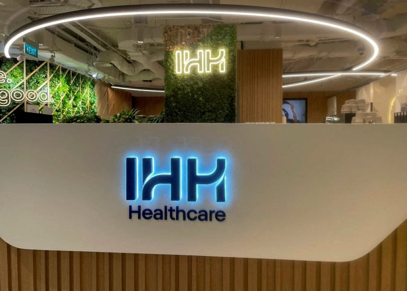 FILE PHOTO: A signage of IHH Healthcare at their corporate office in Singapore