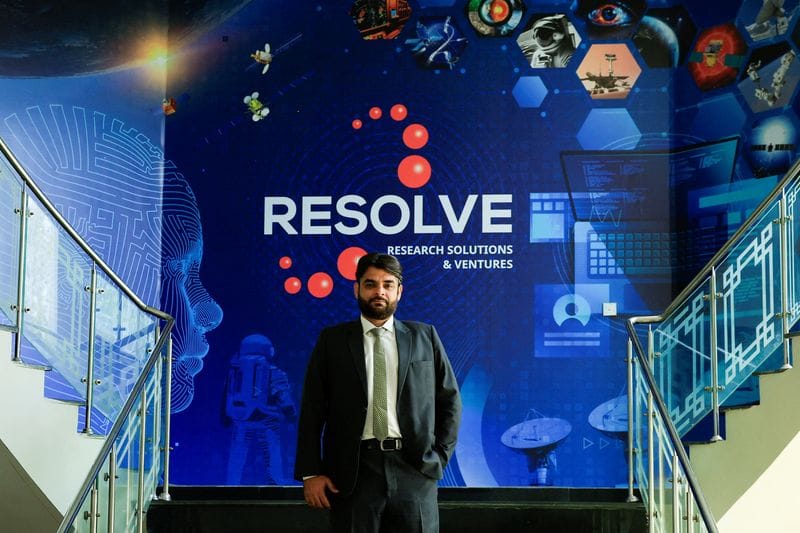 Uzair Ansari, director of artificial intelligence at Pakistan's national space agency, SUPARCO, poses during an interview with Reuters in Karachi