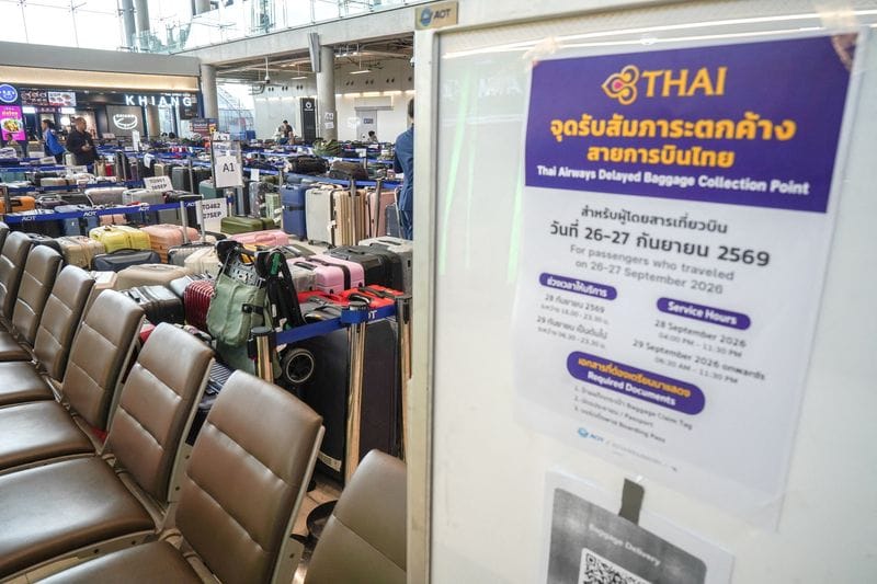 Delayed baggage from Thai Airways, after heavy rain and flooding, at Suvarnabhumi International Airport in Bangkok