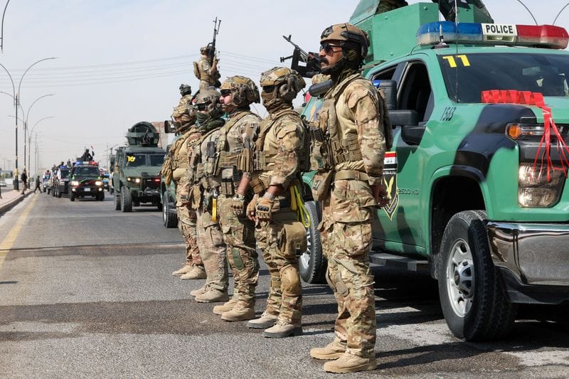 Celebrations after the withdrawal of US-led coalition forces from Iraq, in Najaf