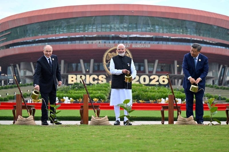 Russia's President Vladimir Putin, India's Prime Minister Narendra Modi and China's President Xi Jinping take part in a joint plantation during the BRICS Summit in New Delhi, India, September 12, 2026. India's Press Information Bureau/Handout via REU