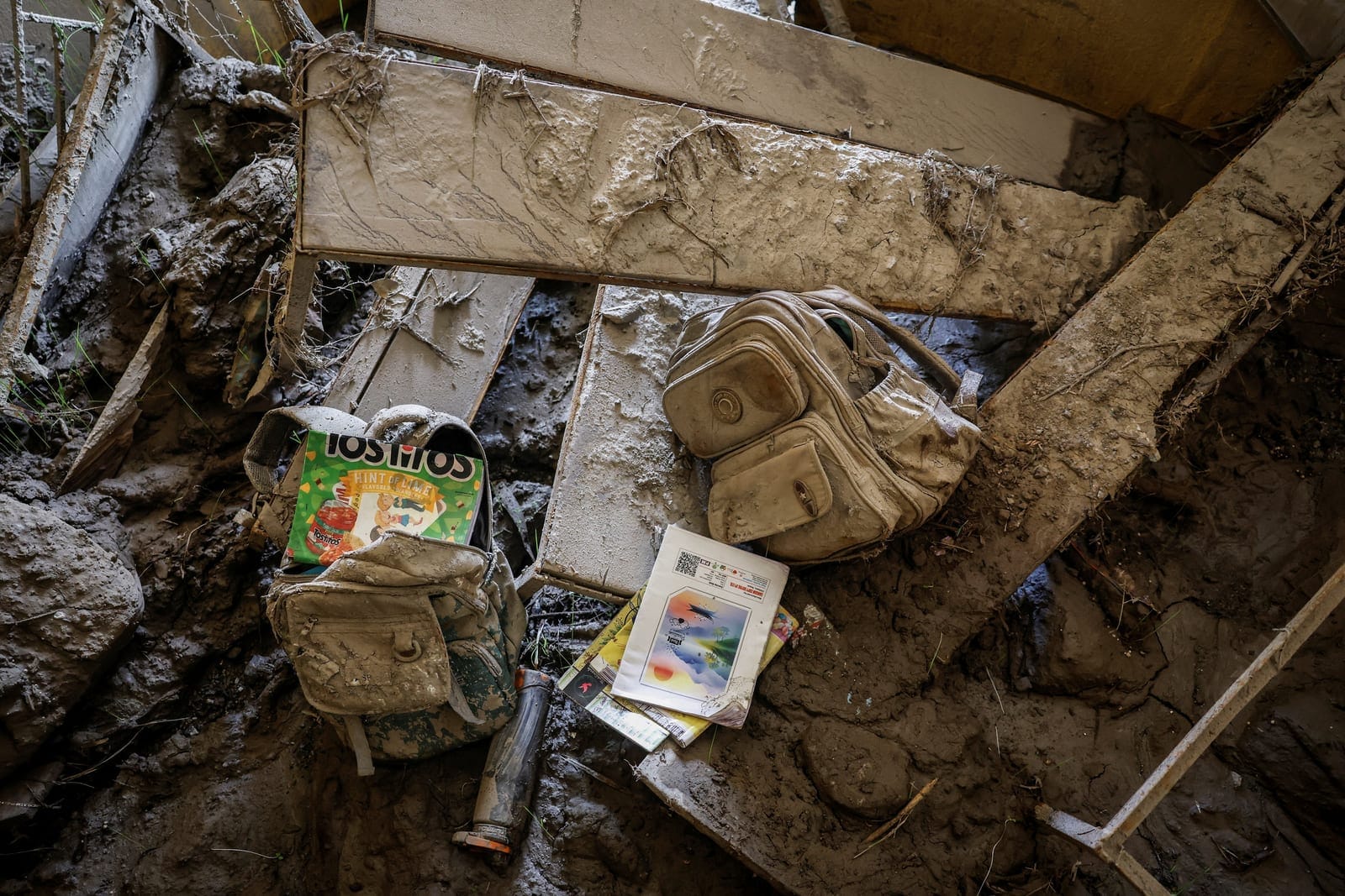 Desks and school bags covered in sludge are seen inside a classroom at Uttargaya Public School following flash floods and mudslides in Angitar, Nuwakot district, Nepal, September 9, 2026. There are 5,130 people still reported missing on the Nepal sid