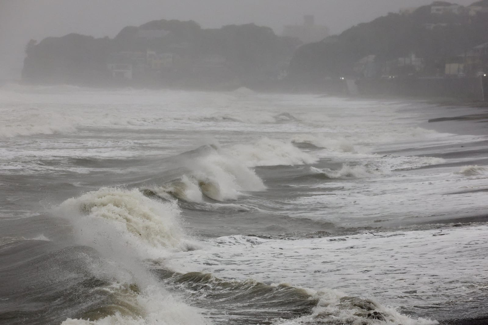 Rough waves hit the coast as Typhoon Dujuan approaches, in Kamakura, Kanagawa Prefecture, Japan, September 21, 2026 in this photo taken by Kyodo. Kyodo/via REUTERS REUTERS/KYODO