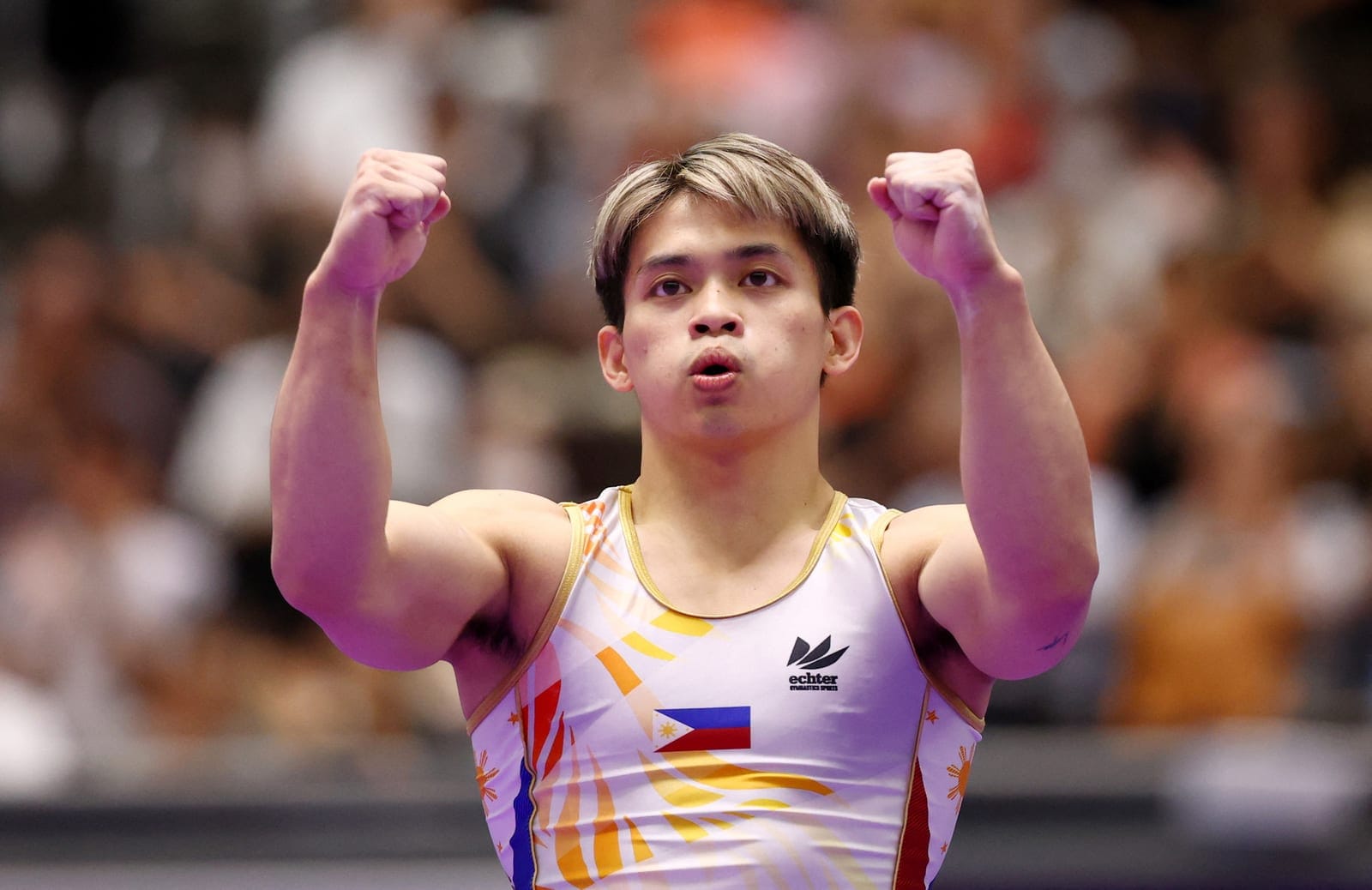 Asian Games - Aichi-Nagoya 2026 - Artistic Gymnastics - Nagoya City General Gymnasium, Nagoya, Japan - September 24, 2026 Philippines' Carlos Edriel Yulo reacts during the men's floor exercise final REUTERS/Edgar Su
