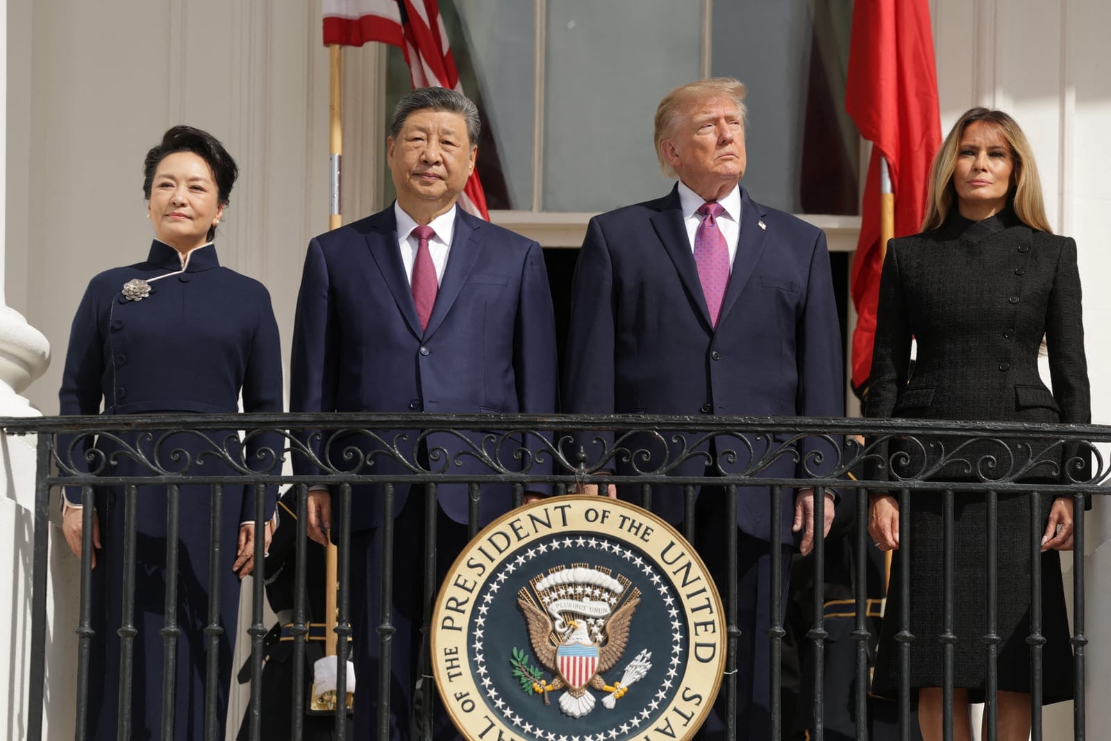 US President Donald Trump, first lady Melania Trump, Chinese President Xi Jinping and his wife, Peng Liyuan watch a military demonstration from a balcony of the White House in Washington, D.C., US, September 24, 2026. REUTERS/Jonathan Ernst