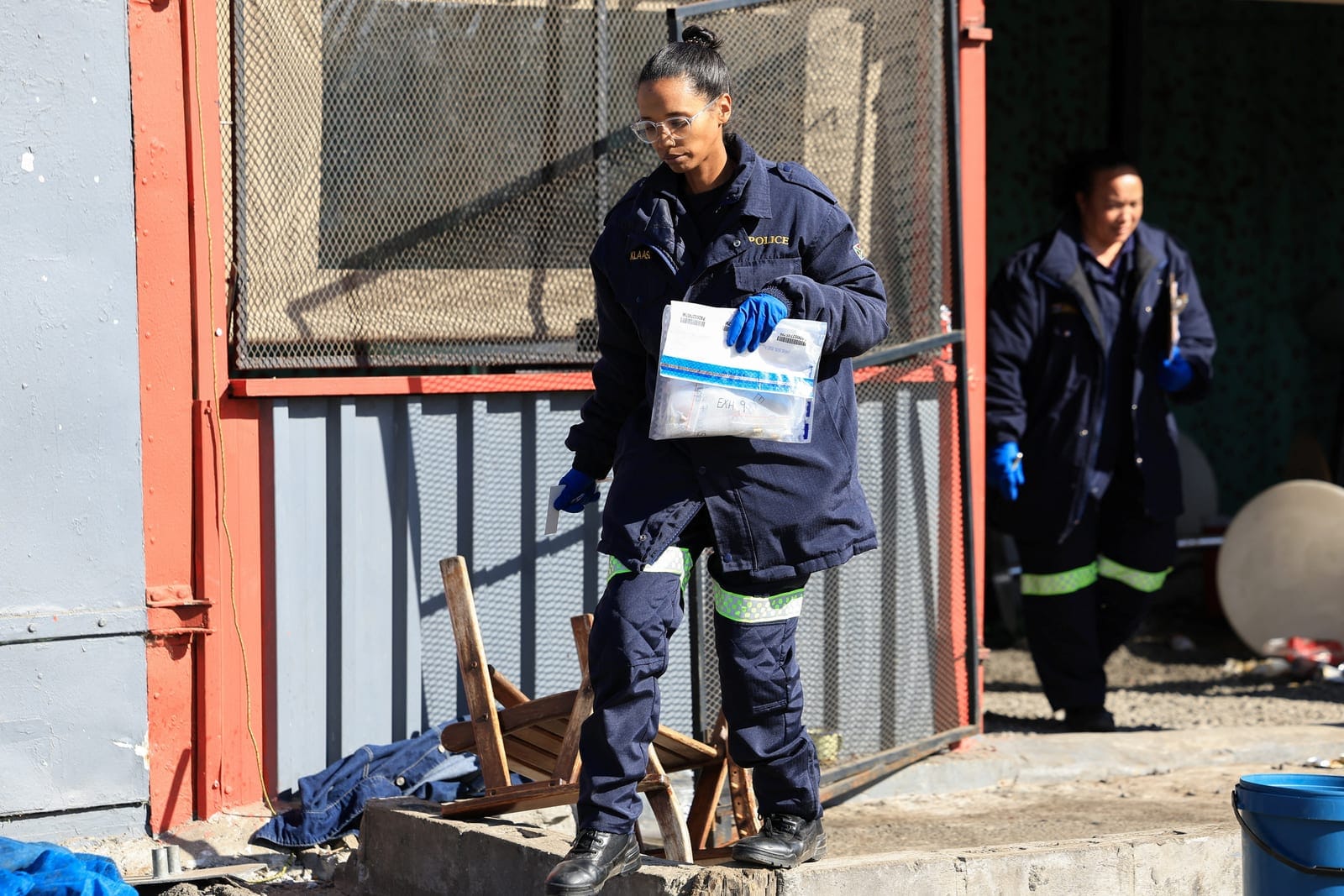Police officers work at site of a shooting in Lwandle in the Western Cape, South Africa, September 27, 2026. REUTERS/Esa Alexander