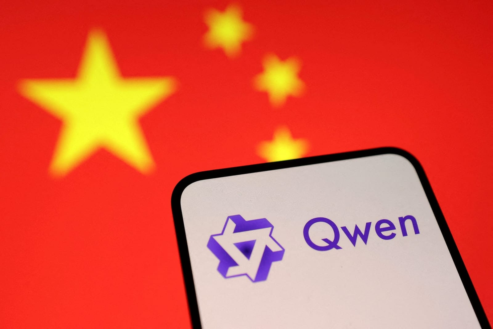 FILE PHOTO: Qwen logo and Chinese flag are seen in this illustration taken, January 29, 2025. REUTERS/Dado Ruvic/Illustration/File Photo