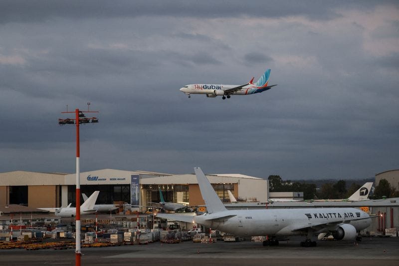 Passengers from a FlyDubai flight to Israel from United Arab Emirates that was diverted to Saudi Arabia after an emergency signal arrive at Ben Gurion International Airport