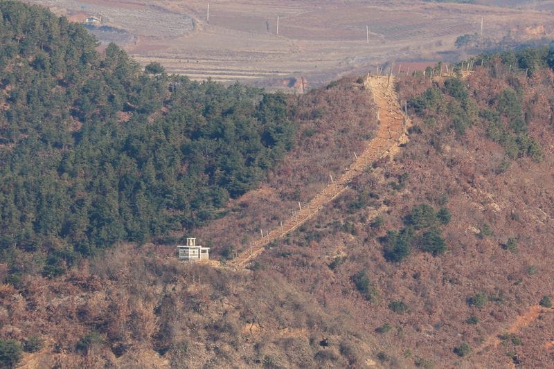 FILE PHOTO: A view shows North Korea's guard post in this picture taken from the top of the Aegibong Peak Observatory, south of the demilitarised zone (DMZ), separating the two Koreas in