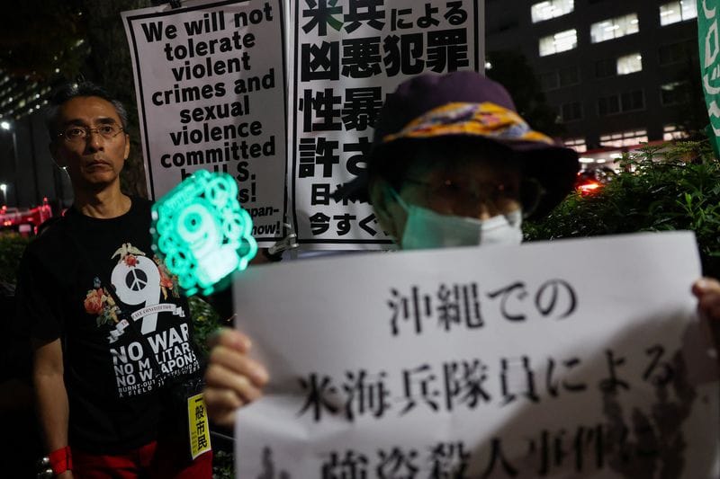 Protest outside Foreign Ministry building following the killing of a Japanese woman in Okinawa, in Tokyo