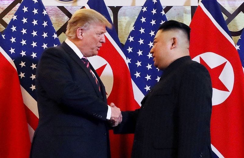 FILE PHOTO: U.S. President Donald Trump meets with North Korean leader Kim Jong Un in Hanoi
