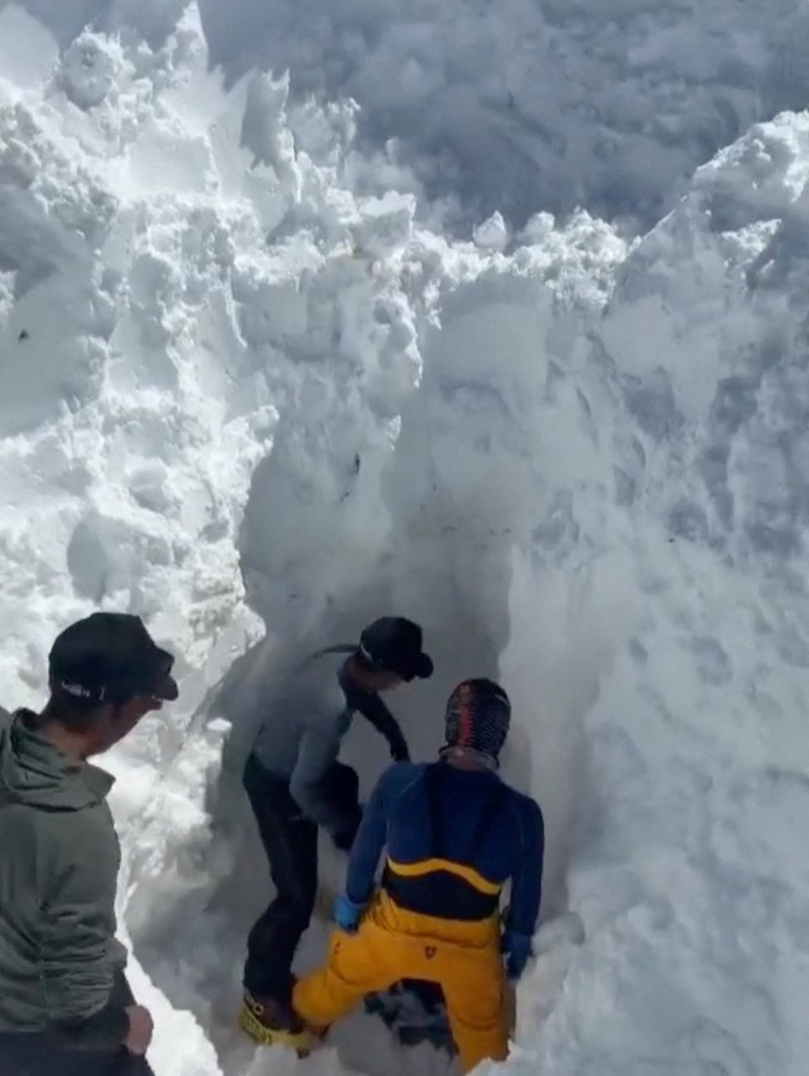 Rescue workers search for survivors after an avalanche buried the Himlung base camp, Nepal, September 28, 2026, resulting in missing climbers and support staff, in this screengrab obtained from a handout video. Nepal National Mountain Guide Associati
