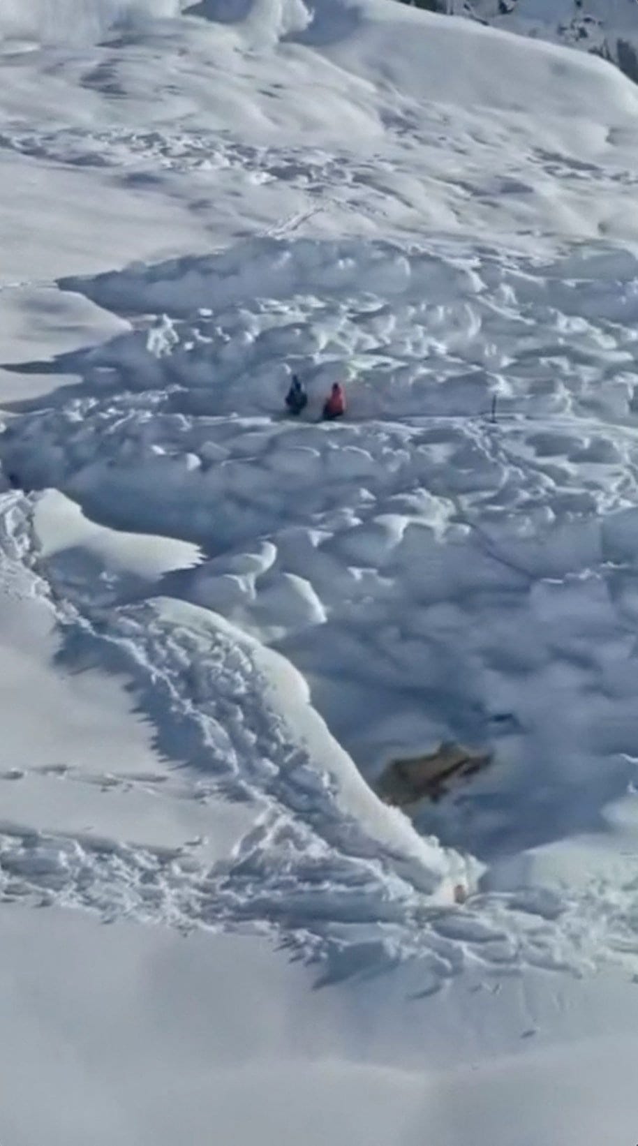 Rescue workers search for survivors after an avalanche buried the Himlung base camp, Nepal, September 28, 2026, resulting in missing climbers and support staff, in this screengrab obtained from a handout video. Nepal National Mountain Guide Associati