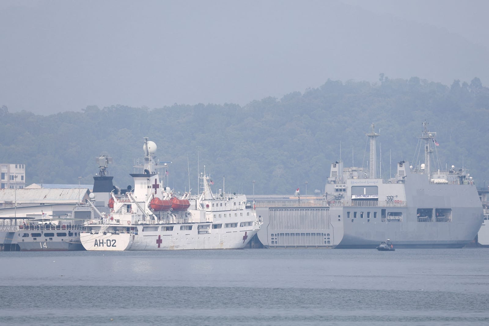 Myanmar Navy vessels UMS King Sin Phyu Shin and UMS Moattama, and Myanmar Navy hospital vessel Thanlwin, which will be used to pick up repatriated Myanmar nationals from Malaysia, are docked at the Lumut Naval Base in Lumut, Malaysia, September 29, 2