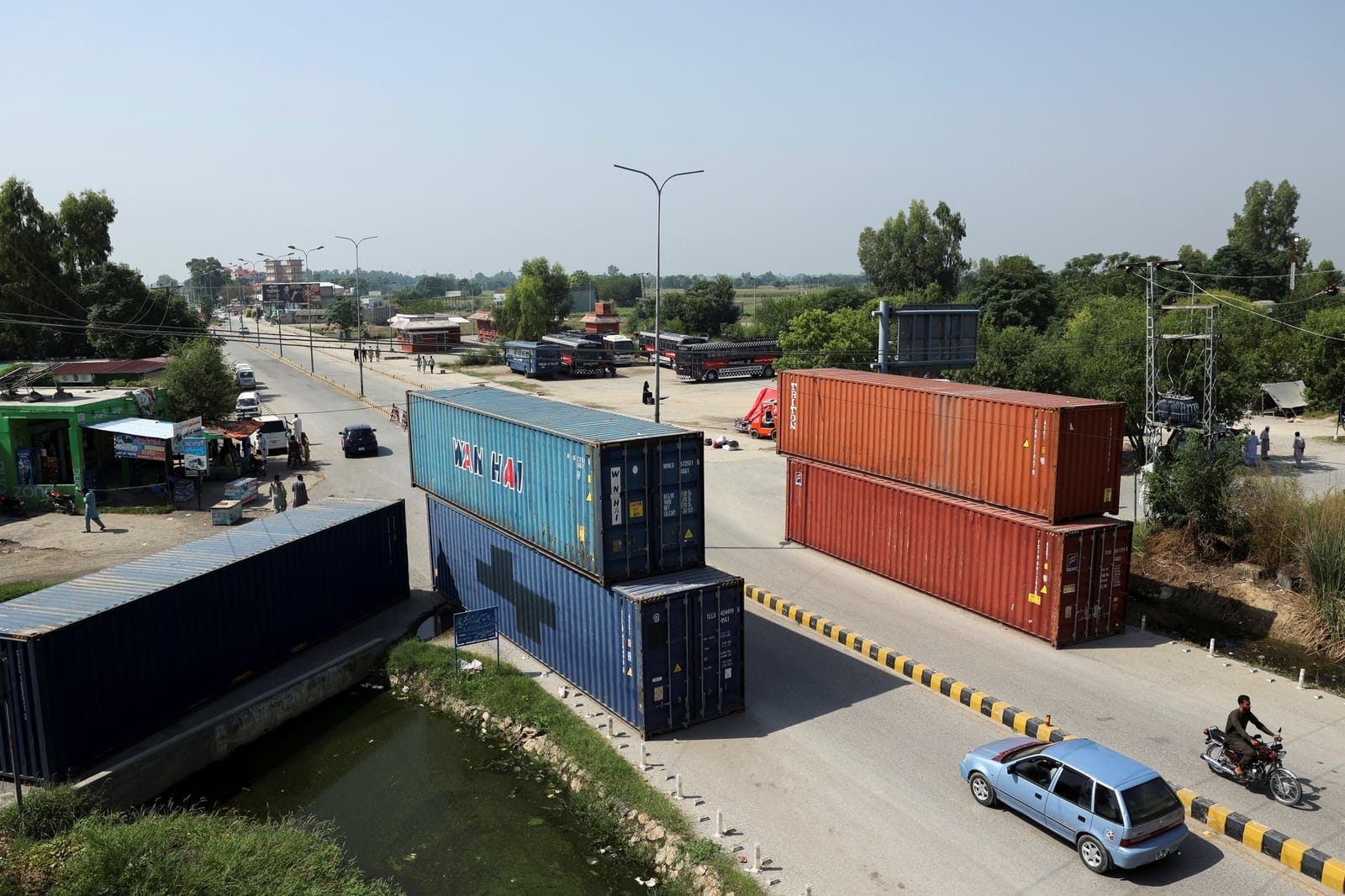Shipping containers used to block the area, ahead of a planned march by former Pakistani Prime Minister Imran Khan's party Pakistan Tehreek-e-Insaf (PTI), in Islamabad, Pakistan, September 30, 2026. REUTERS/Stringer