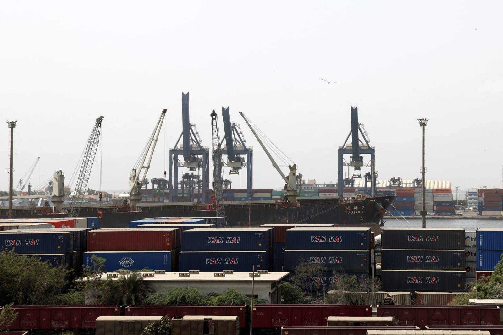 Shipping containers are stacked at the port area in Karachi, Pakistan, September 30, 2026. REUTERS/Stringer