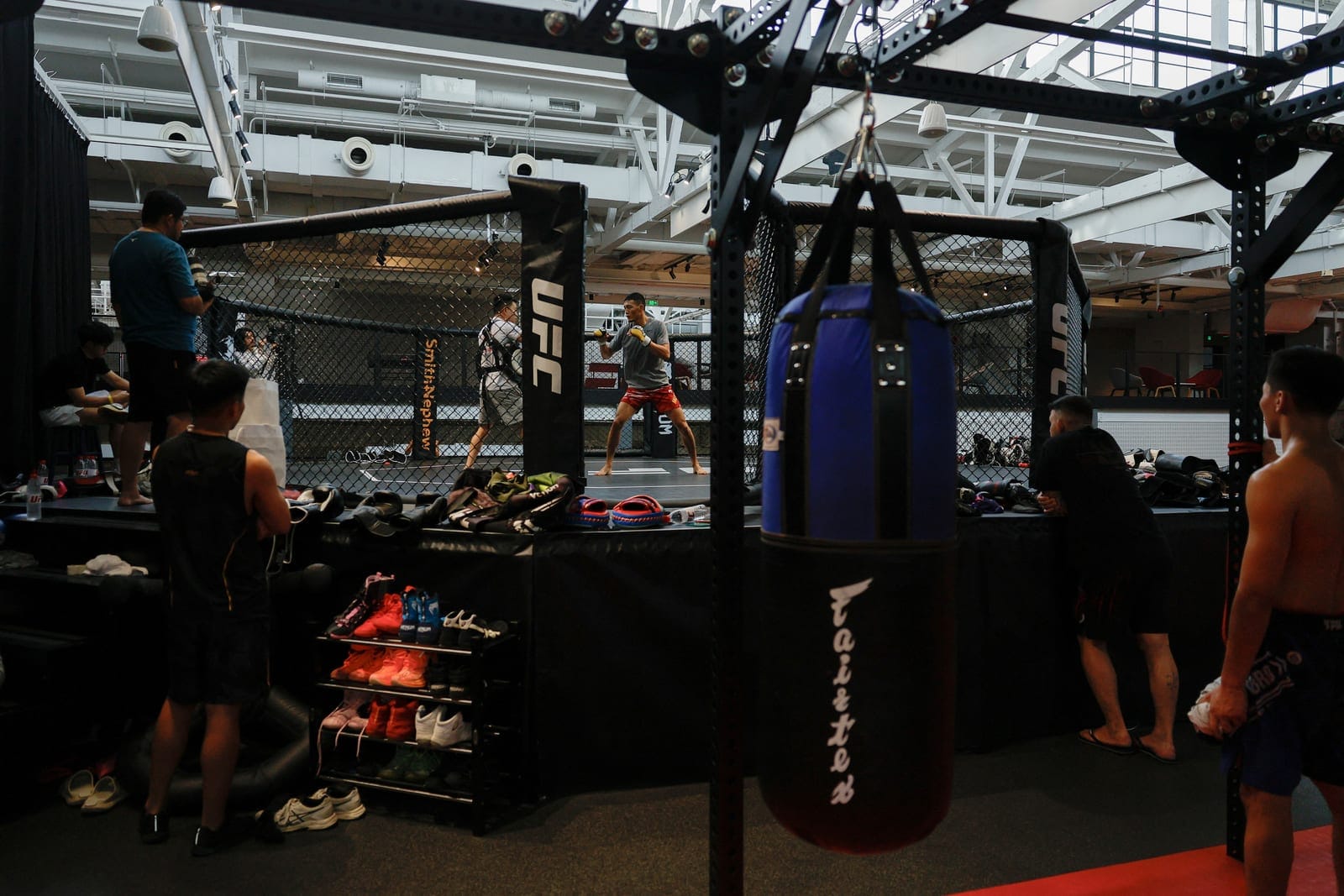 UFC flyweight fighter Su Mudaerji stands in the Octagon during a practice session at the UFC Performance Institute in Shanghai, China, August 20, 2026. REUTERS/Go Nakamura