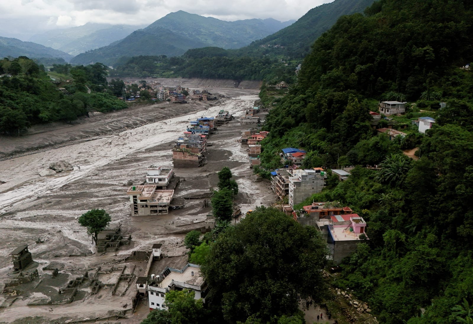 A drone view of mud covered properties following a flash flood at Trishuli in Nuwakot district, Nepal, August 26, 2026. REUTERS/Navesh Chitrakar