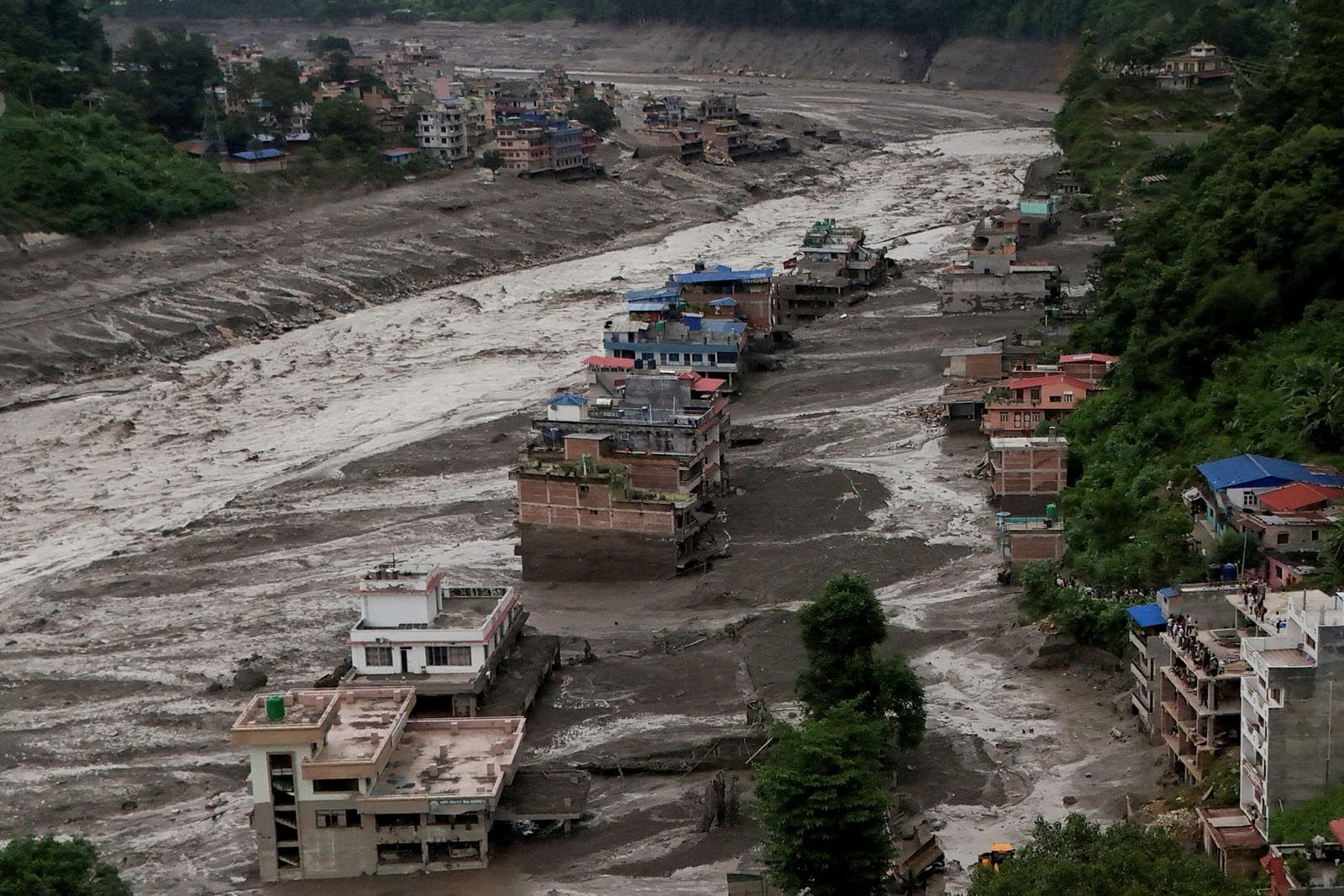 A drone view of mud covered properties following a flash flood at Trishuli in Nuwakot district, Nepal, August 26, 2026. REUTERS/Navesh Chitrakar