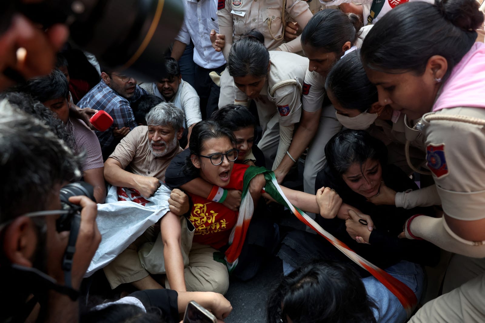 Neha Bora, National President of the All India Students' Association (AISA), reacts as she is detained by police during a protest demanding the resignation of India's Chief Election Commissioner Gyanesh Kumar, in New Delhi, India, October 2, 2026. RE