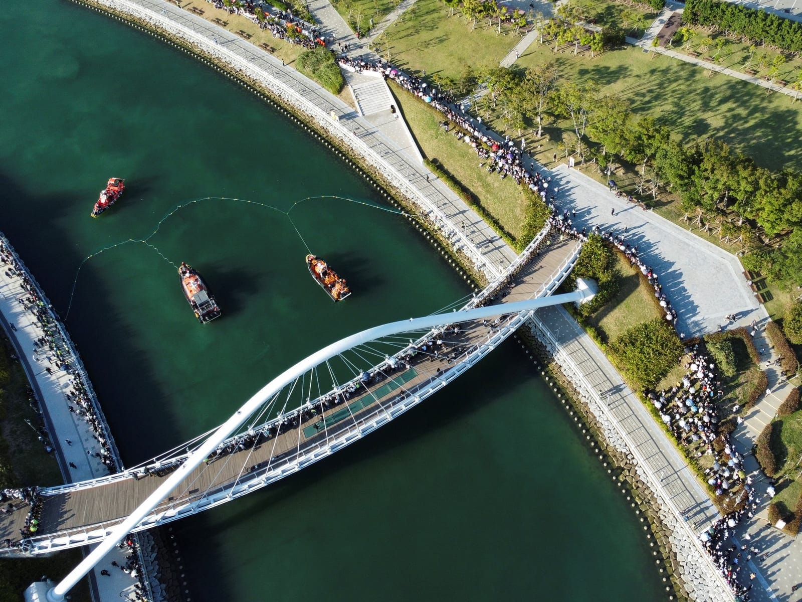 A drone view of boats and a net during an operation to guide a shark nicknamed "Bukangi" out of a canal at the North Port in Busan, South Korea, October 2, 2026. REUTERS/Kim Soo-hyeon
