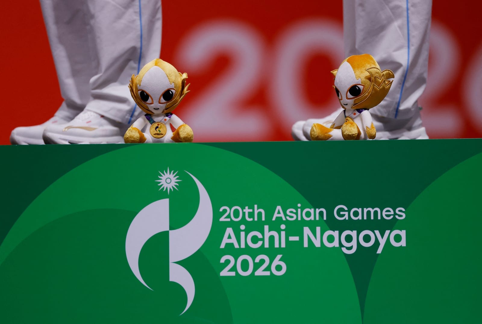 Asian Games - Aichi-Nagoya 2026 - Fencing - Aichi International Exhibition Center, Tokoname, Japan - September 25, 2026 General view of the toy mascots Honohon on the podium REUTERS/Andrew Couldridge