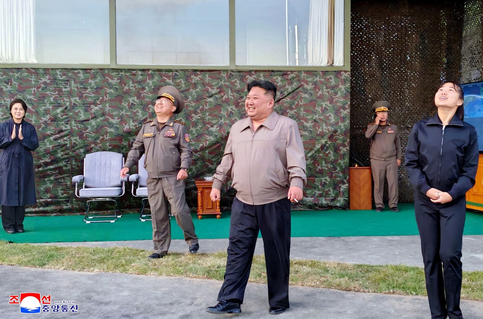 North Korean leader Kim Jong Un, accompanied by his daughter Kim Ju Ae, attends to oversee the firing of an intermediate-range missile from the eastern region of the country toward the East Sea during a drill in North Korea, October 3, 2026, in this 
