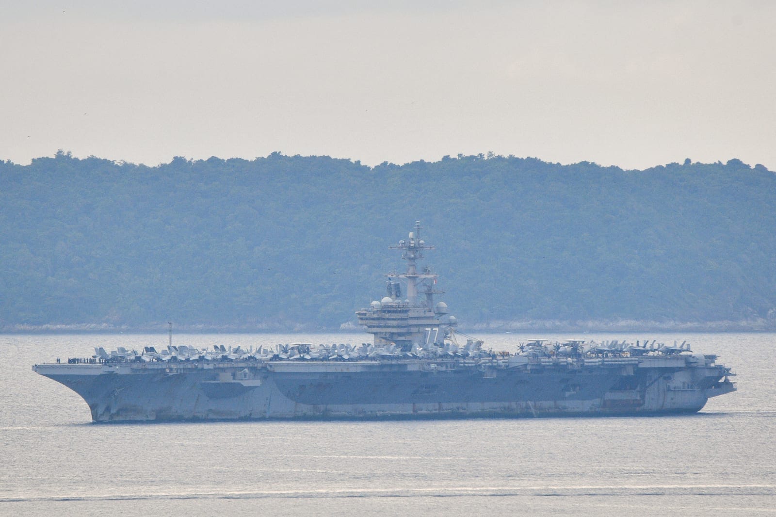 The USS George H.W. Bush arrives near Phuket Deep Sea Port before docking for a rest stop following a long deployment in the Middle East, in Phuket, Thailand, October 4, 2026. REUTERS/Sooppharoek Teepapan