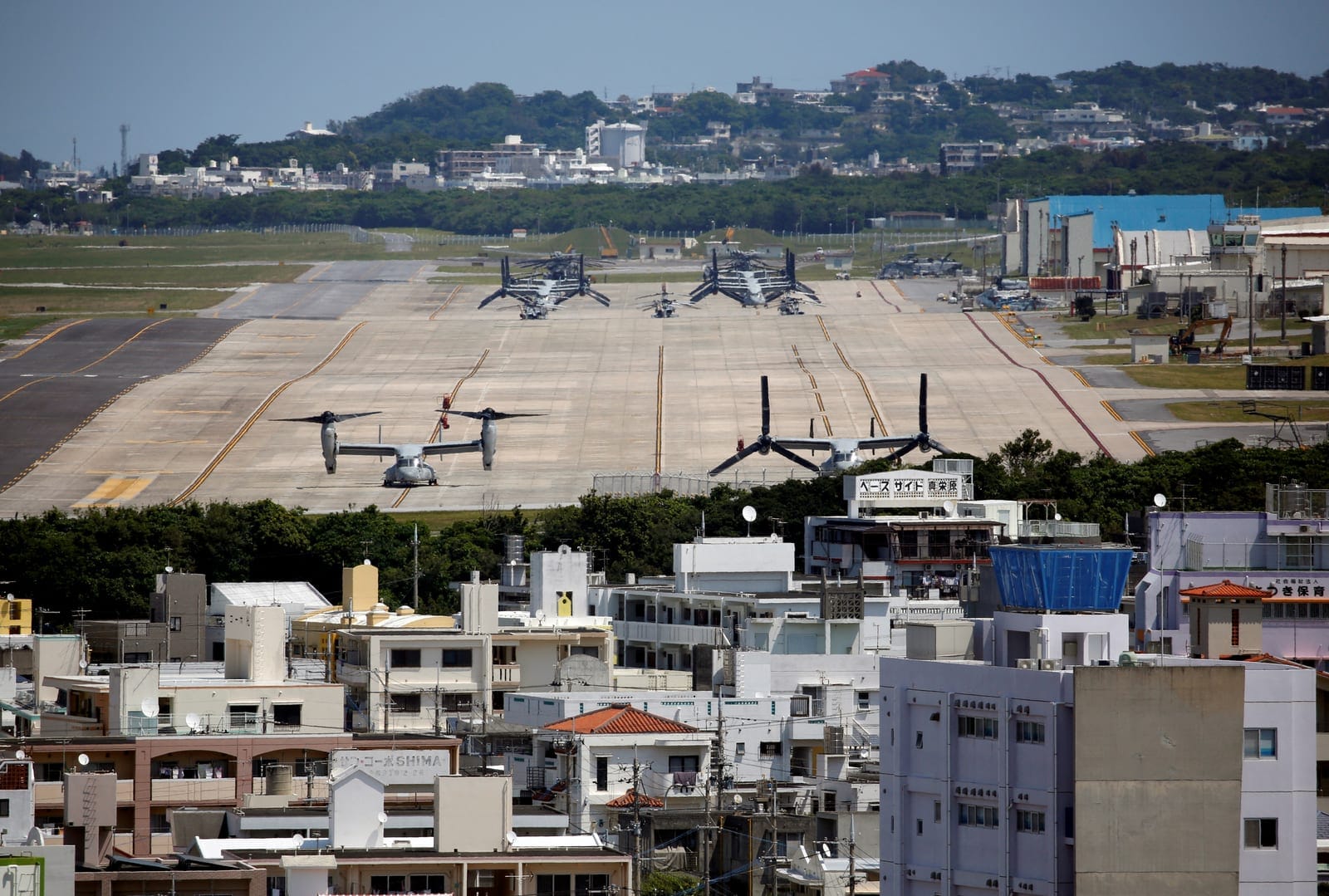 FILE PHOTO: U.S. Marine Corps MV-22 Osprey aircrafts are seen at the U.S. Marine Corps' Futenma Air Station in Ginowan on Japan's southernmost island of Okinawa March 24, 2018. REUTERS/Issei Kato/File Photo