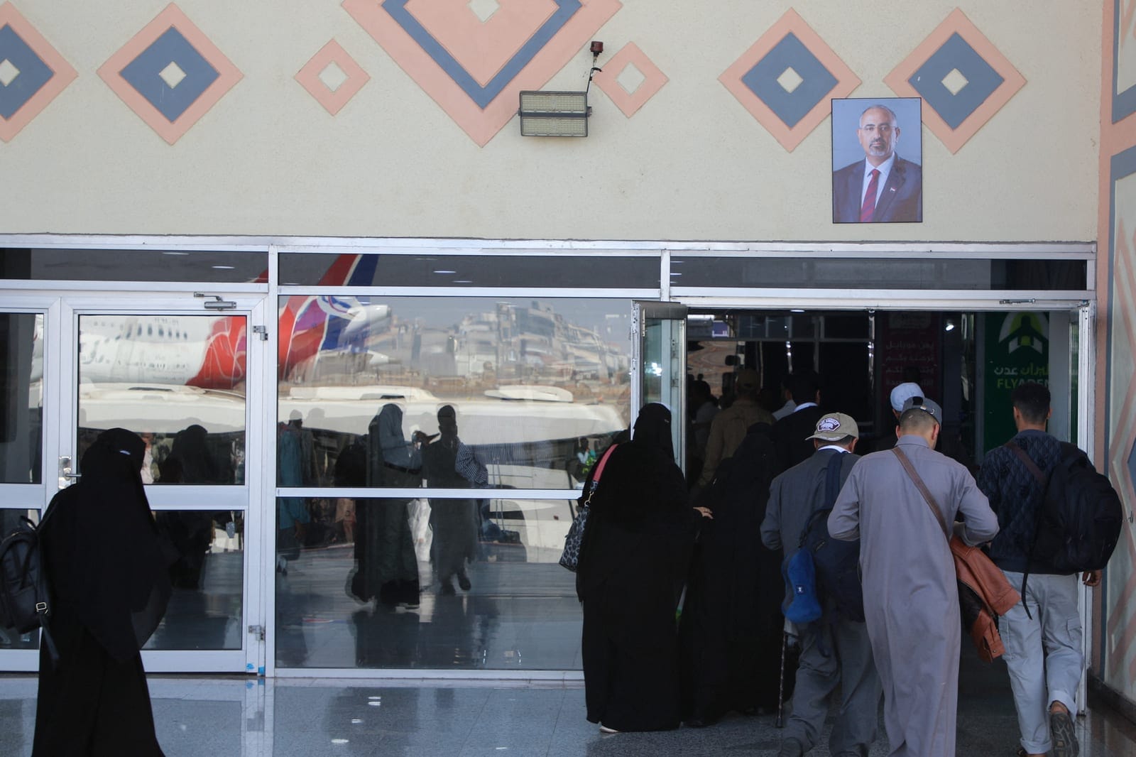 FILE PHOTO: Passengers walk at the arrival lounge of Aden Airport in Aden, Yemen January 1, 2026. REUTERS/Fawaz Salman/File Photo