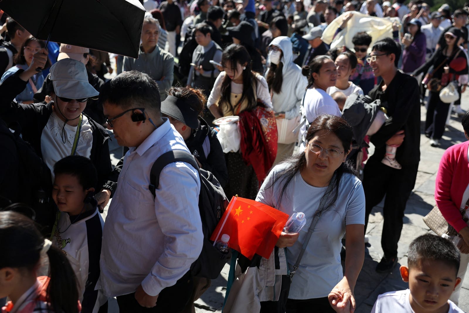 Visitors tour the Temple of Heaven, also known as Tiantan Park, on National Day, the first day of China's Golden Week holiday, in Beijing, China, October 1, 2026. REUTERS/Florence Lo