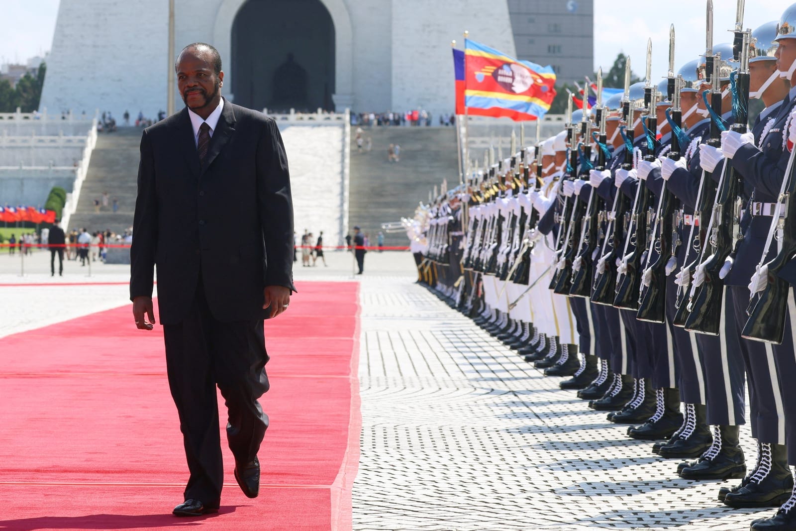 Eswatini's King Mswati III reviews the honour guard as he attends a welcome ceremony with Taiwan's President Lai Ching-te (not pictured) in Taipei, Taiwan, October 9, 2026. REUTERS/Tsai Hsin-Han