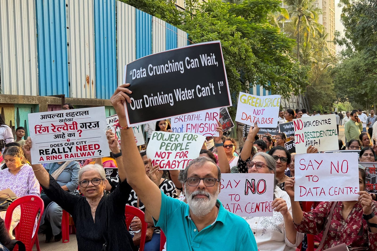 Residents hold placards during a protest against Amazon's planned data centre, in Thane, on the outskirts of Mumbai, India, September 8, 2026. Picture taken with a mobile phone. REUTERS/Vibhuti Sharma