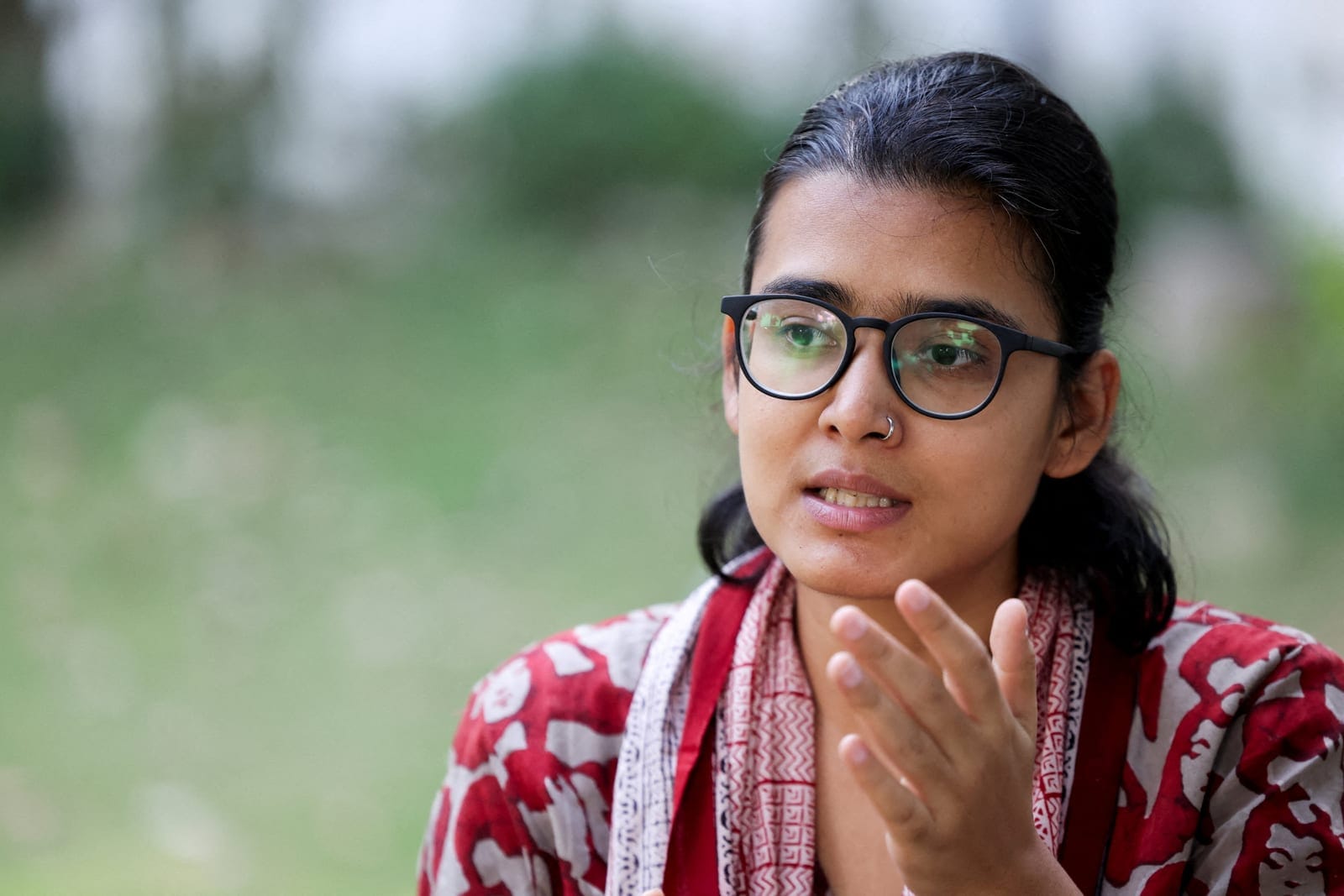 PICTURE TAKEN OCTOBER 1, 2026: Neha Bora, national president of the All India Students' Association (AISA), gestures during an interview with Reuters, in New Delhi, India, October 1, 2026. REUTERS/Bhawika Chhabra