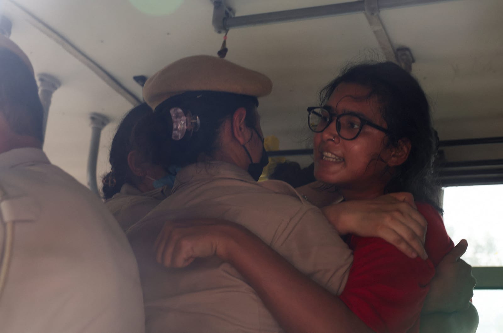 Neha Bora, National President of the All India Students' Association (AISA), gets detained during a protest organised by the Cockroach Janta Party (CJP) seeking the resignation of India's Chief Election Commissioner, Gyanesh Kumar, in New Delhi, Indi