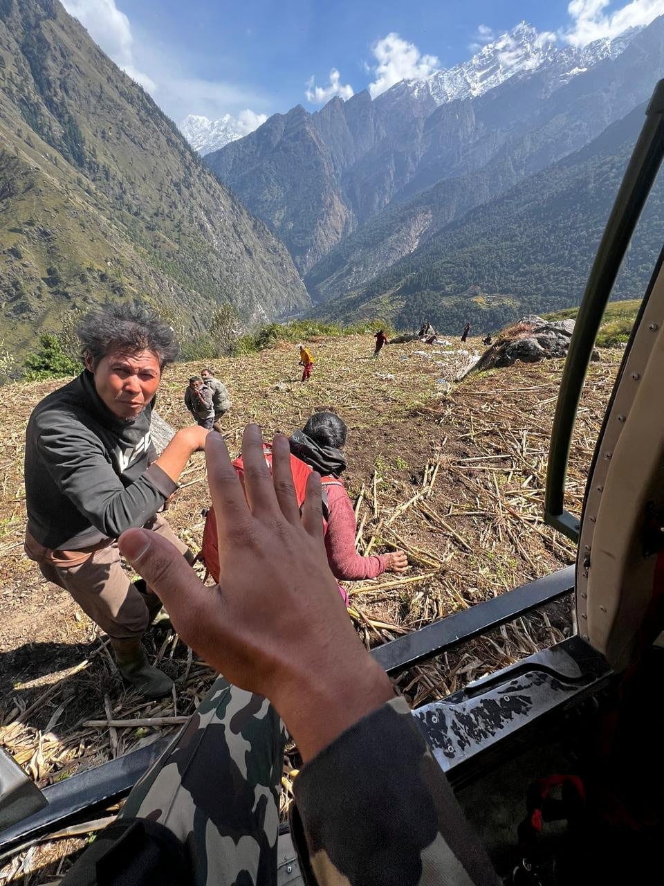 Nepal Army helicopter rescues people from areas affected by flooding of Budhi Gandaki River following a dry landslide in Chumnubri village, Gorkha district, Nepal, in this handout obtained by Reuters on October 11, 2026. Nepal Army/Handout via REUTER