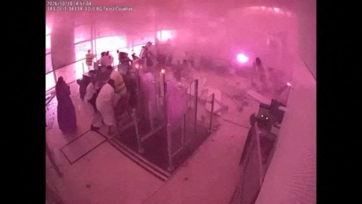Surveillance footage shows smoke and fire as people react at the moment of an attack at King Khalid International Airport in Riyadh, Saudi Arabia, October 10, 2026, in this frame from a handout video. Saudi Ministry of Media/Handout via REUTERS REUTE