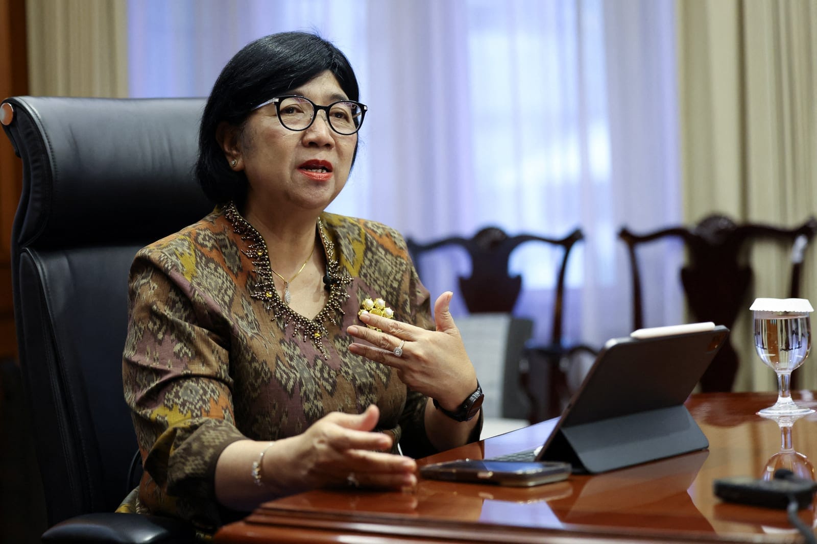 Governor of Bank Indonesia Destry Damayanti gestures during an interview with Reuters at Bank Indonesia headquarters in Jakarta, Indonesia, October 12, 2026. REUTERS/Ajeng Dinar Ulfiana