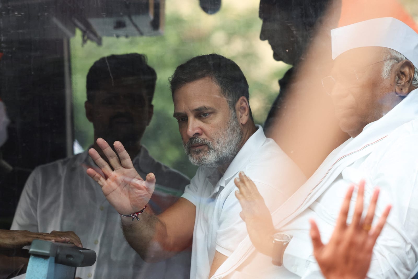 Congress leader and Leader of Opposition Rahul Gandhi waves to supporters as opposition parties march to the Supreme Court to protest a controversial revision of voter lists that has sparked days of unrest, in New Delhi, India, October 12, 2026. REUT