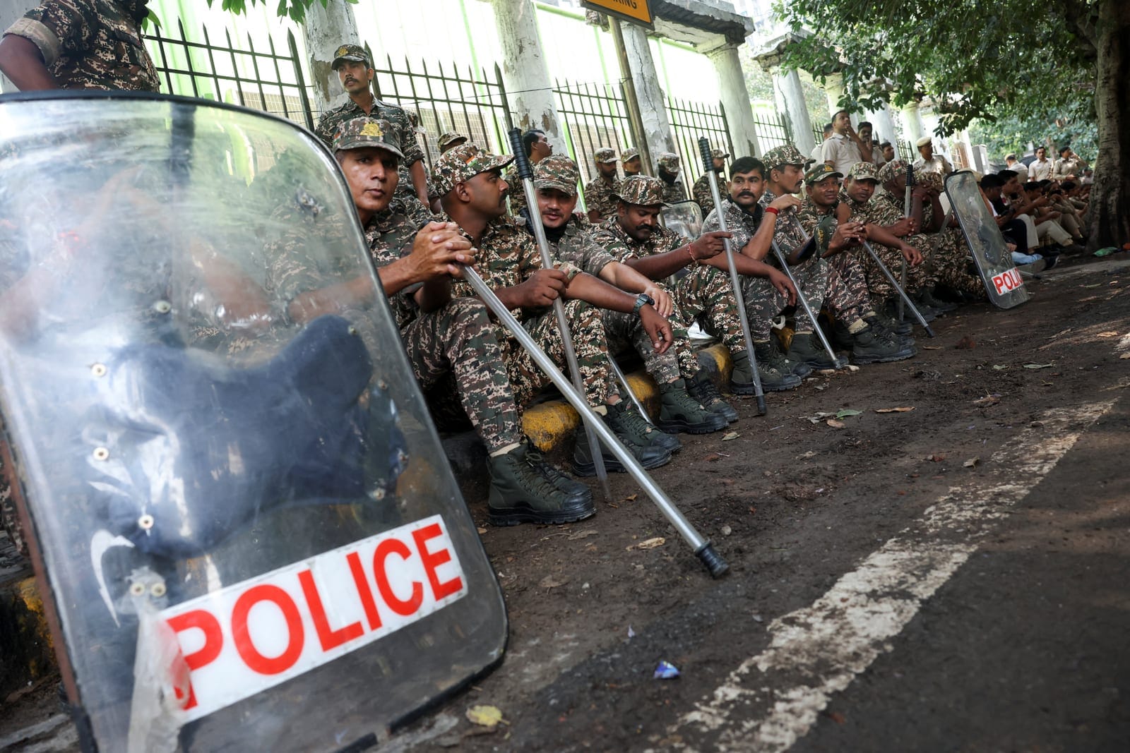 Security personnel gather as opposition parties plan a march to the Supreme Court in protest against a controversial revision of voter lists that has sparked days of unrest, in New Delhi, India, October 12, 2026. REUTERS/Priyanshu Singh