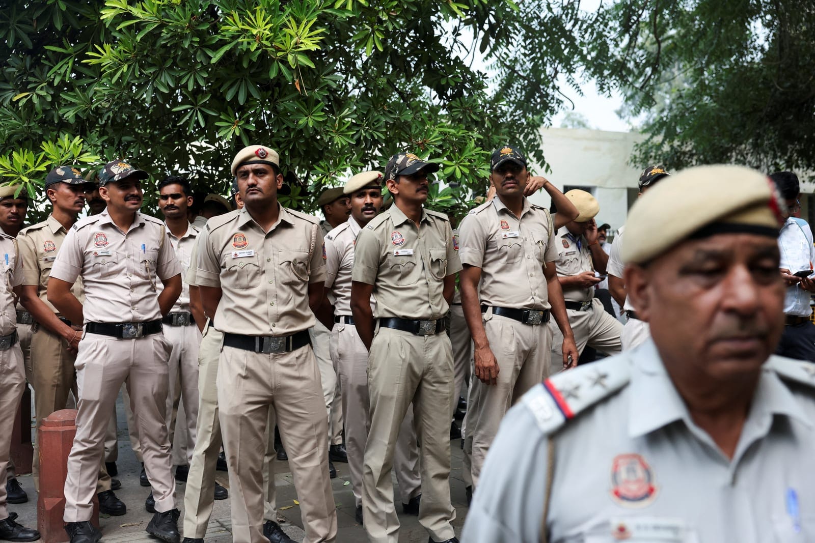 Security personnel gather as opposition parties plan a march to the Supreme Court in protest against a controversial revision of voter lists that has sparked days of unrest, in New Delhi, India, October 12, 2026. REUTERS/Priyanshu Singh