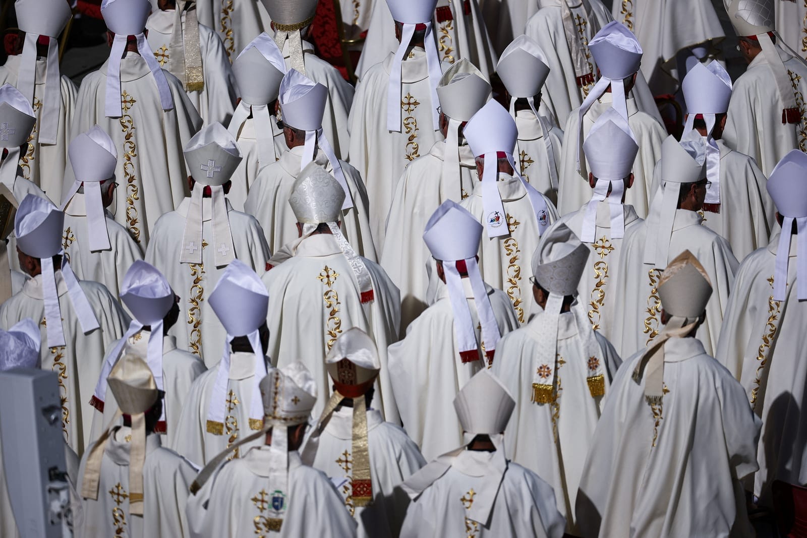 Clergy attend a Mass led by Cardinal Luis Antonio Tagle marking the 10th anniversary of the apostolic exhortation Amoris Laetitia, including special prayers for the health of Pope Leo, who is in hospital after lung surgery, in St. Peter's Square at t