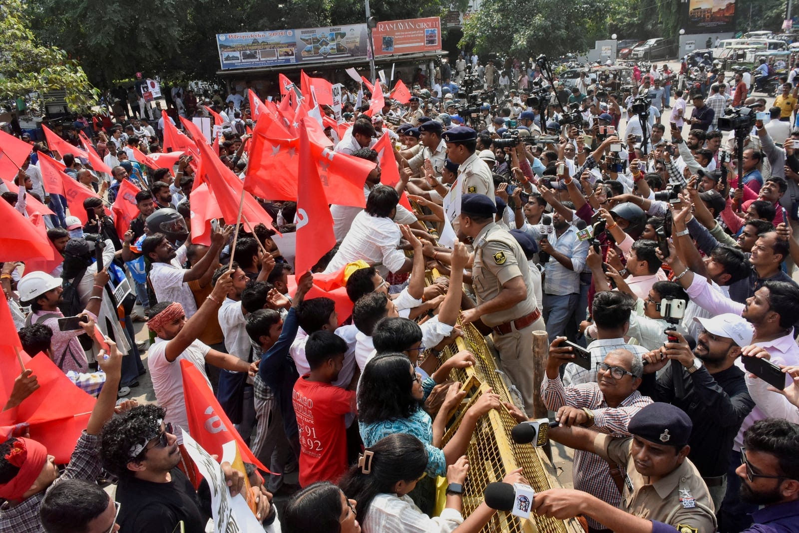 Police personnel exchange words with protesters near a barricade during a demonstration by the All India Students' Association (AISA) demanding the resignation of India's Chief Election Commissioner, Gyanesh Kumar, in Patna, India, October 13, 2026.