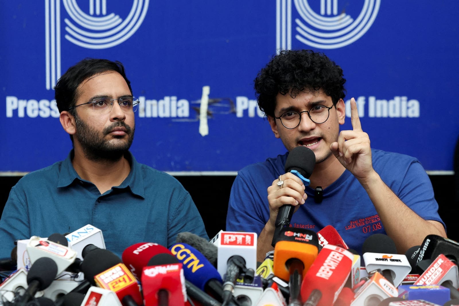 Saurav Das, chief spokesperson of the Cockroach Janta Party (CJP), speaks next to Ashutosh Ranka, co-convenner of CJP, during a press conference at the Press Club of India following their release, amid protests demanding the resignation of India's Ch