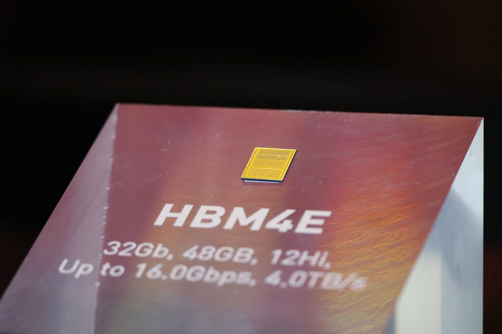 An SK Hynix's HBM4E (High Bandwidth Memory 4 Enhanced) memory chip is displayed at its booth during the 28th Semiconductor Exhibition in Seoul, South Korea, October 16, 2026. REUTERS/Kim Hong-Ji