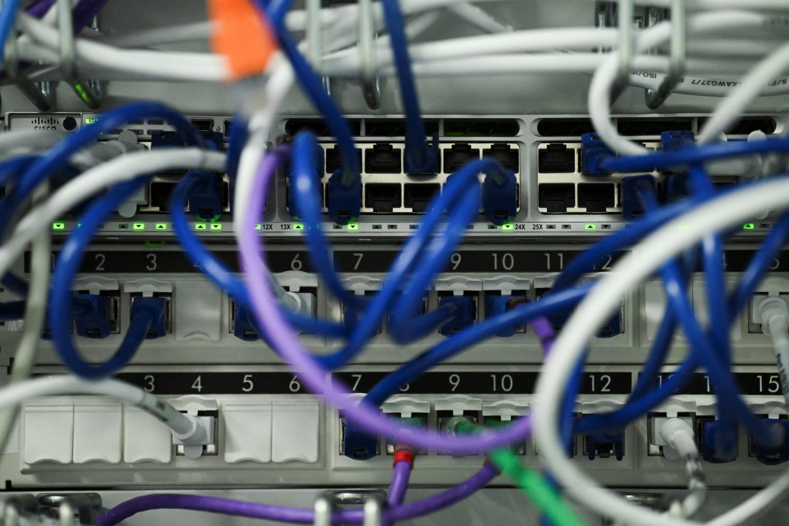 LAN network cables plugged into a computer server, as cyber agencies warn that websites may be taken offline while PHP prepares a critical fix, in Berlin, Germany, October 21, 2026. REUTERS/Annegret Hilse
