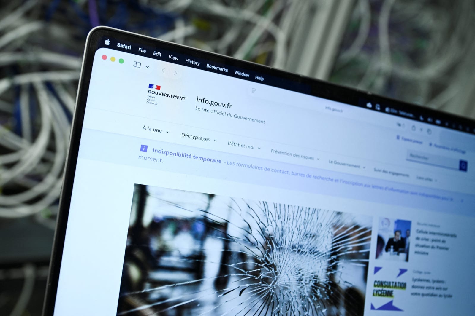 A screen displays the unavailable French government website, info.gouv.fr, as cyber agencies warn that websites may be taken offline while PHP prepares a critical fix, in Berlin, Germany, October 21, 2026. REUTERS/Annegret Hilse