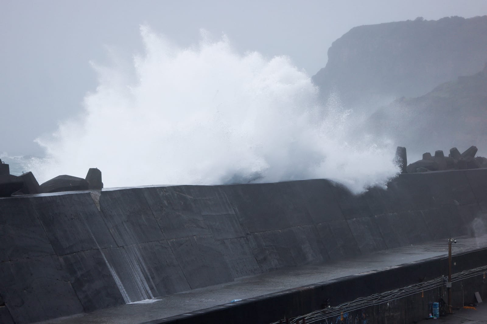 Waves crash against a breakwater as Typhoon Champi approaches Taiwan, at Badouzi Fishing Port in Keelung, Taiwan, October 23, 2026. REUTERS/Ann Wang
